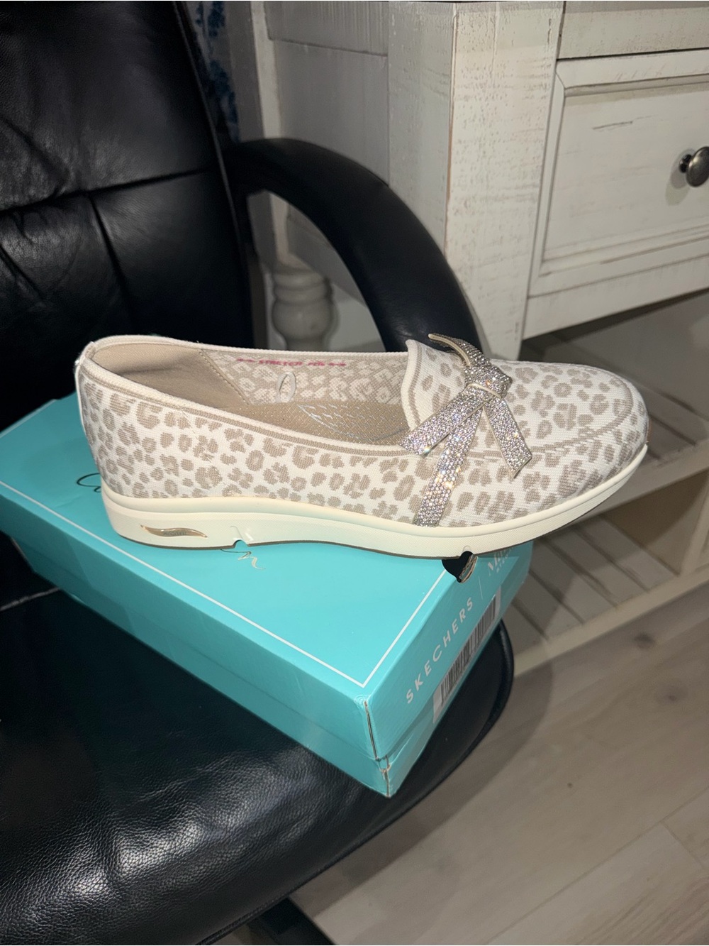 Skechers Women's Beige Leopard Slip-On with Sparkle Bow Accent